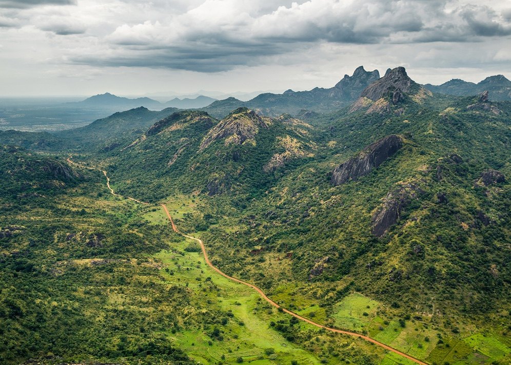 The Kidepo valley: granite hills, wooded slopes and open grassland on the valley floor